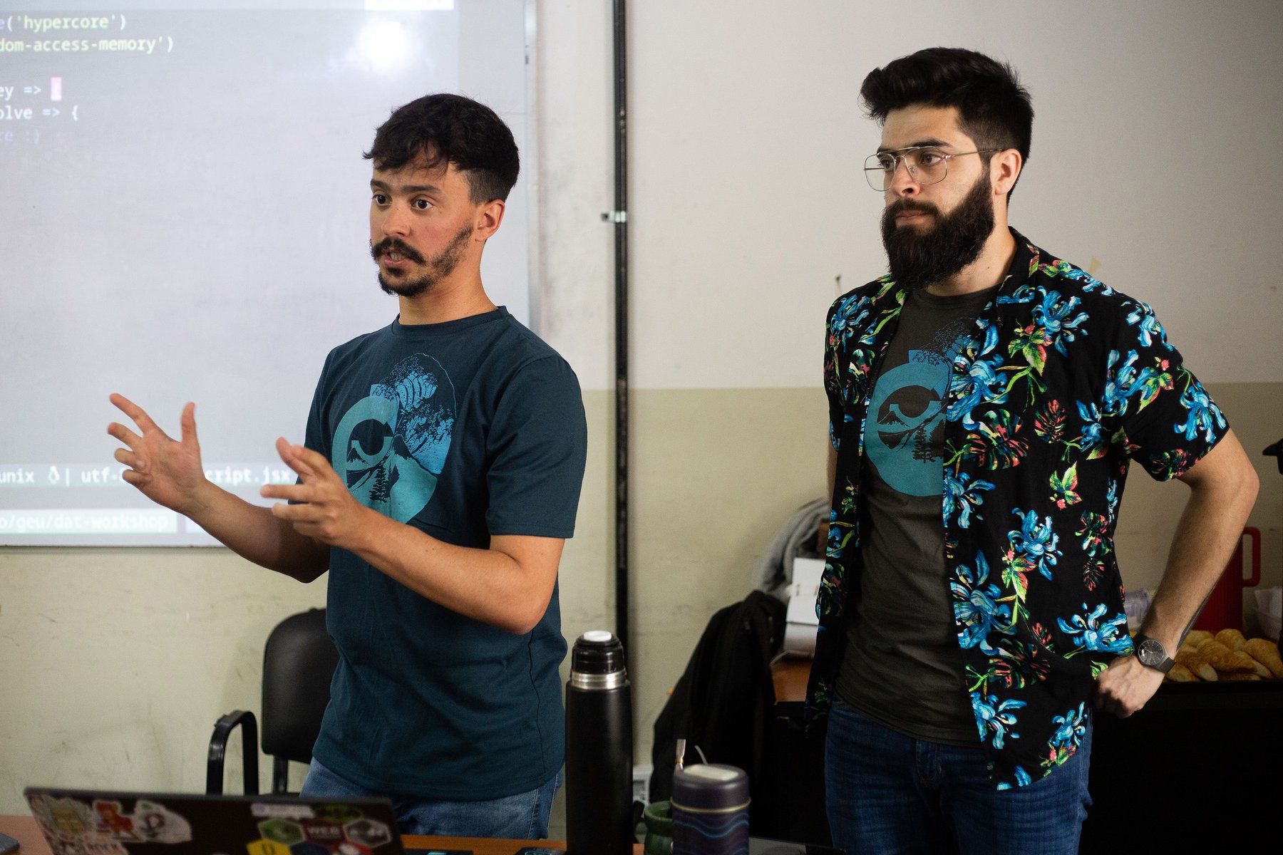 GEUT team members, Martin and Diego giving the 1st edition of the Dat Workshop at NodeConf Argentina 2018.
